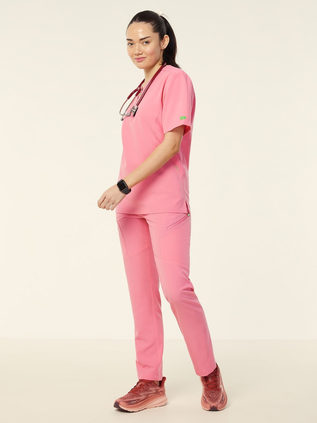 NNT CATRHL Invigorate Unisex Charles Scrub Top - Pink - Angled View