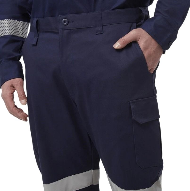 Navy blue work pants with reflective stripes on a white background