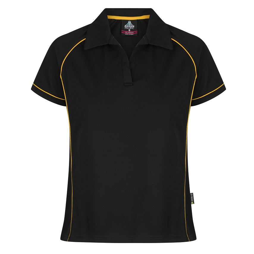 A black and gold colored ladies' polo shirt with contrast piping at the raglan, side panel, and sleeve cuff, featuring a V-neck Johnny collar and side splits.