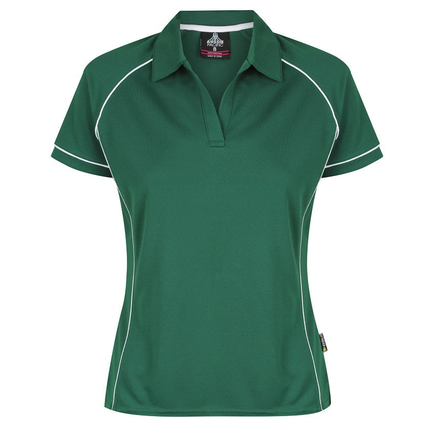 A green and white Aussie Pacific Endeavour ladies polo shirt with contrast piping at the raglan, side panel, and sleeve cuff, displayed on a plain background.