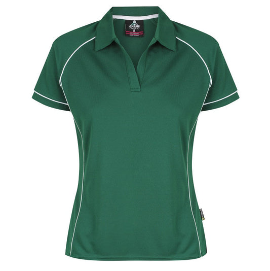 A green and white Aussie Pacific Endeavour ladies polo shirt with contrast piping at the raglan, side panel, and sleeve cuff, displayed on a plain background.