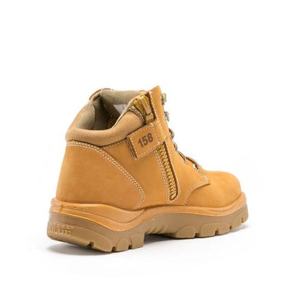 Yellow hiking boot on a white background
