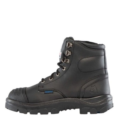 Black work boot with a white background