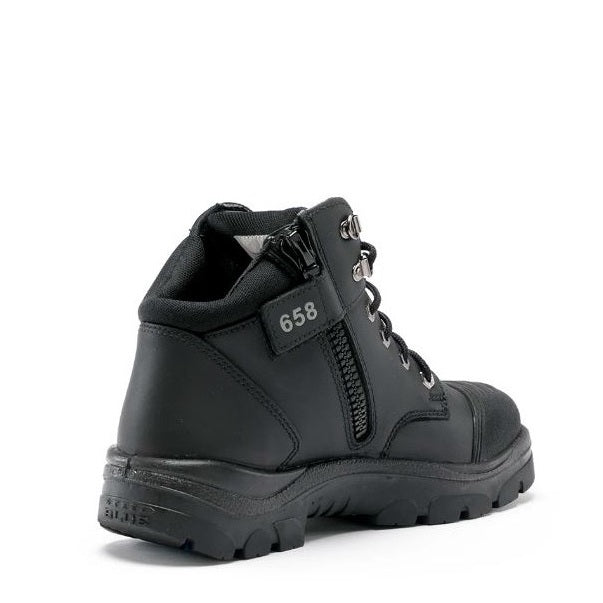 Black boot with zipper on a white background