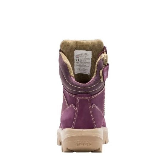 Purple boot with beige sole on a white background