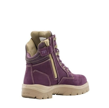 Purple boot with beige accents on a white background