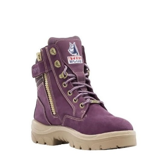 Purple boot with beige sole on a white background