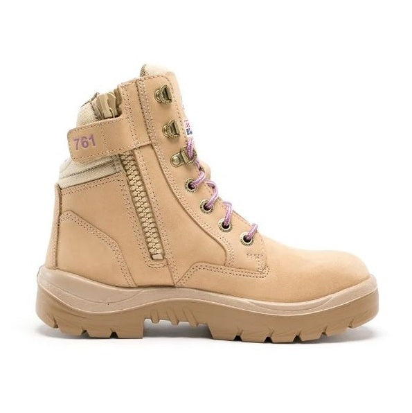A pair of Steel Blue Southern Cross Zip ladies safety boots with nitrile outsole, in  sand colour, featuring lace-up closure and steel toe cap.
