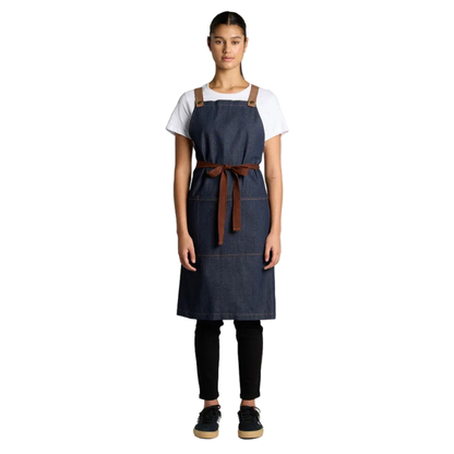 Indigo Denim bib apron with brown leather straps and waist tie, AS Colour 1084 Apron, model front view