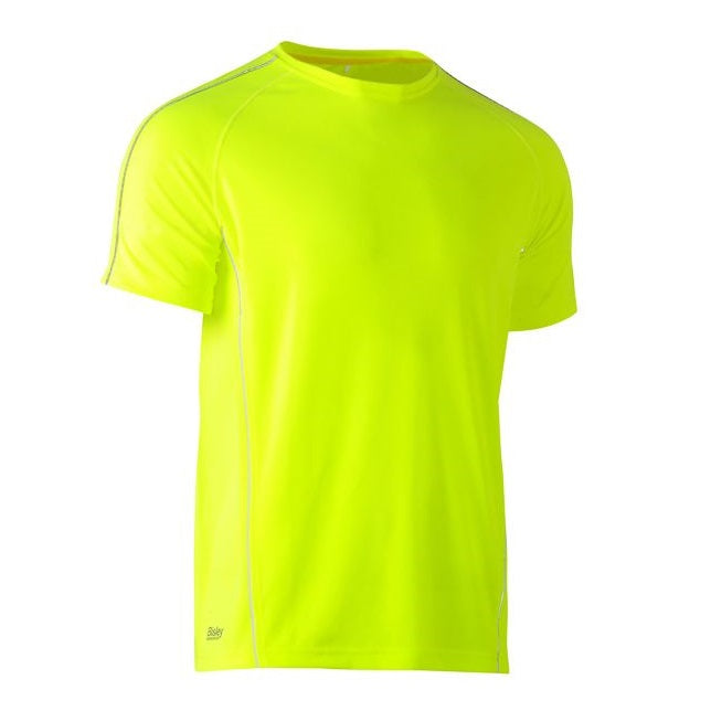 Bright yellow athletic shirt on a white background
