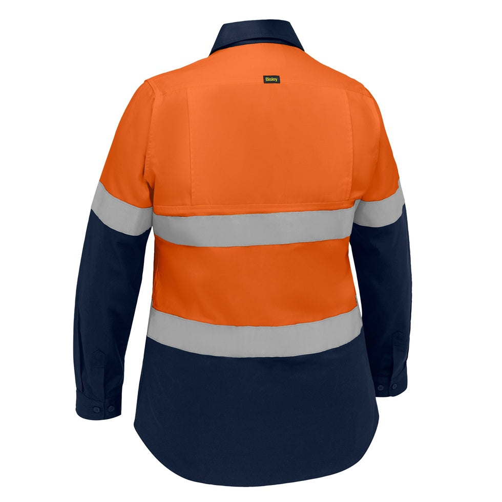Back view of an orange and navy work shirt with reflective stripes on a white background