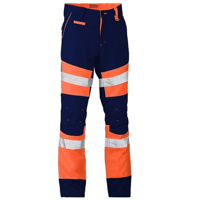 High-visibility work pants in navy blue and bright orange with reflective tape, Bisley BP6412T Taped Biomotion 2-Tone Pants, front view, modern fit