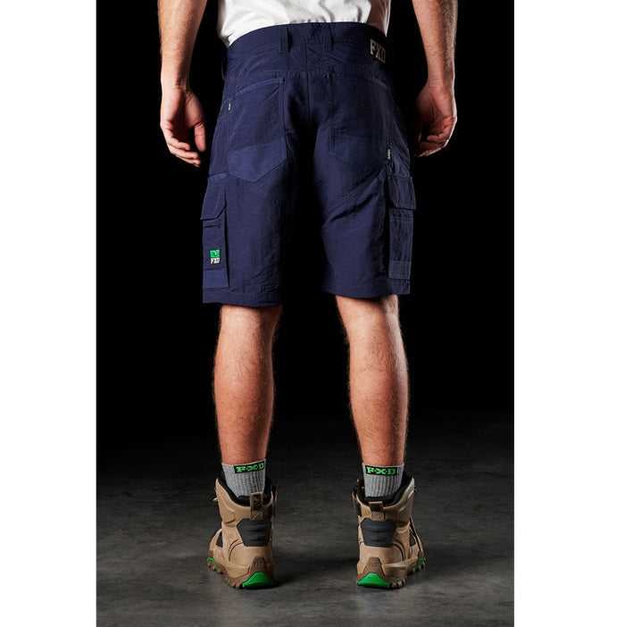 Mens navy blue cargo shorts with rear pockets and abrasion resistant fabric, FXD LS-1 Lightweight Stretch Work Shorts rear view
