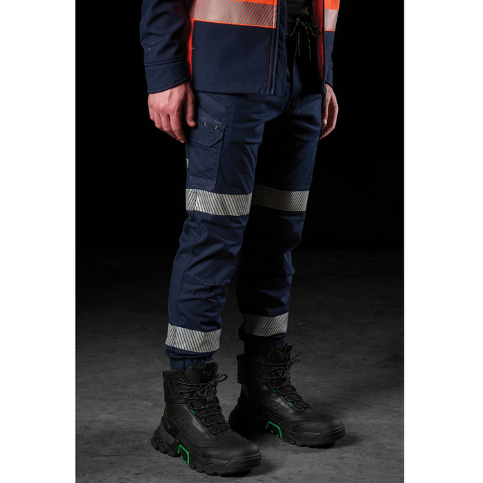 Mens navy blue cuffed cargo pants front side angle view, FXD WP-12CT Reflective Taped Elastic Waist Stretch Ripstop Pant