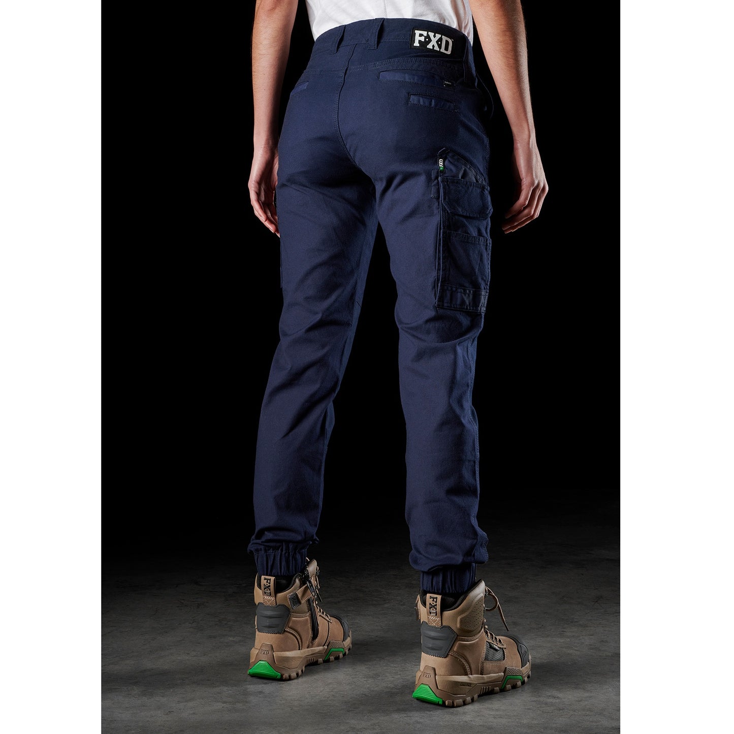 ladies navy blue worksite cargo pants, cuffed ankle, FXD WP-4W Womens Stretch Cuffed Pant rear angle view