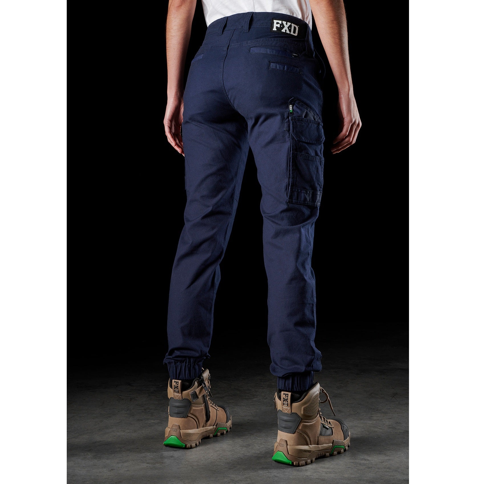 ladies navy blue worksite cargo pants, cuffed ankle, FXD WP-4W Womens Stretch Cuffed Pant rear angle view