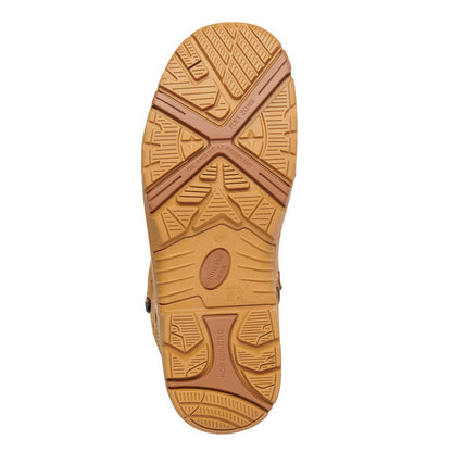 Brown sole of a shoe with tread pattern on a white background