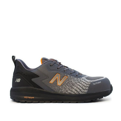 Grey and black with orange accents sneaker Slip resistant airport friendly  New Balance MIDSPWR Speedware Composite Safety Joggers
