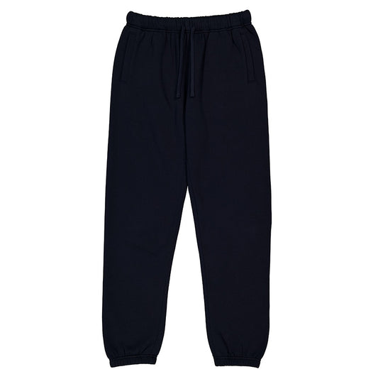 Navy track pants on white background