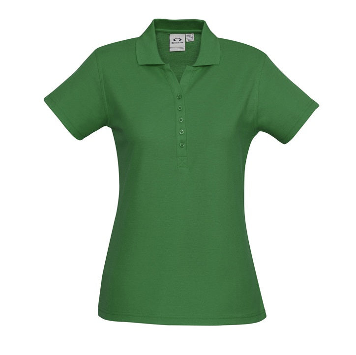 A green Biz Collection ladies' polo shirt with a collar, short sleeves, and a Y-placket.
