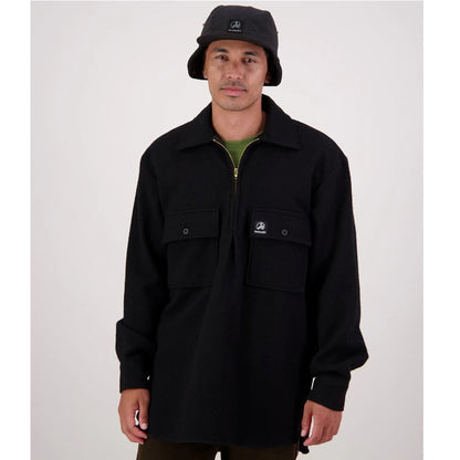 Person wearing a black jacket and hat on a white background