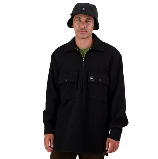 Man wearing a black jacket and hat on a white background