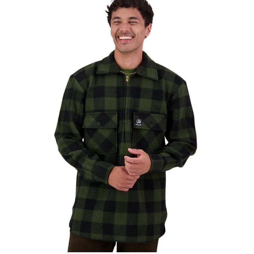 Man wearing a green and black checkered shirt on a white background