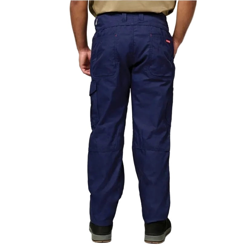 Navy blue cargo pants worn by a person on a white background