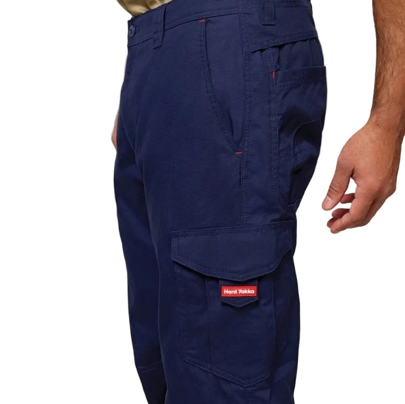 Navy blue pants with a visible brand logo on a white background