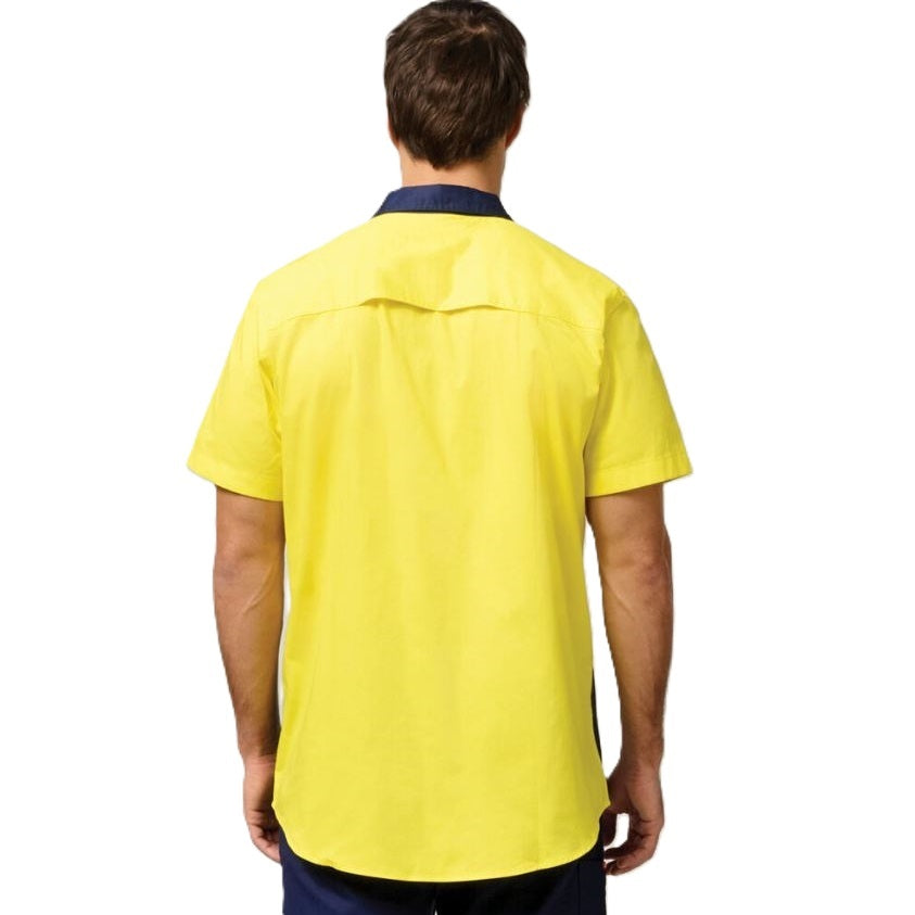 Person wearing a yellow polo shirt on a white background