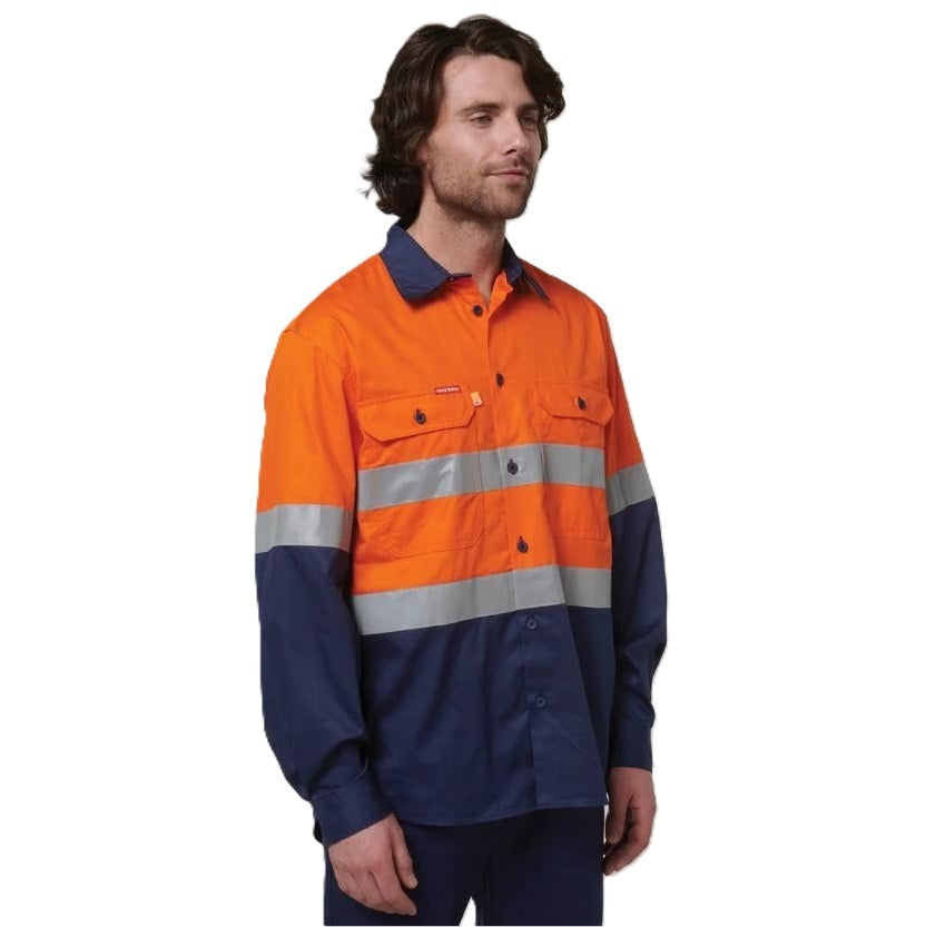 Person wearing an orange and navy high-visibility work shirt on a white background