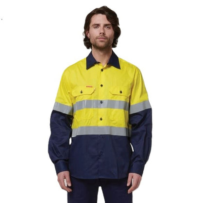 Person wearing a high-visibility yellow and navy work shirt on a white background