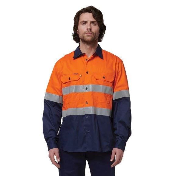 Person wearing an orange and navy high-visibility work shirt on a white background