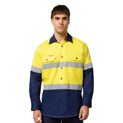Person wearing a yellow and navy high-visibility work shirt on a white background