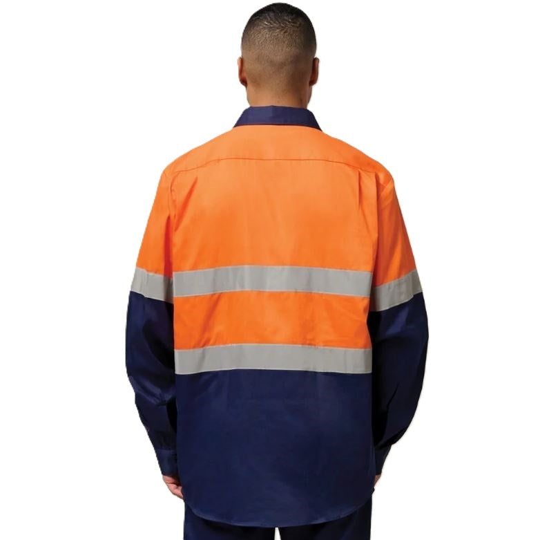 Person wearing a high-visibility orange and navy work shirt on a white background