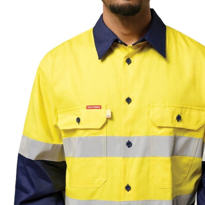 Yellow and navy work jacket with reflective stripe on a white background