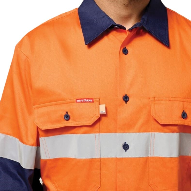 Orange work shirt with reflective stripe and brand logo on a white background