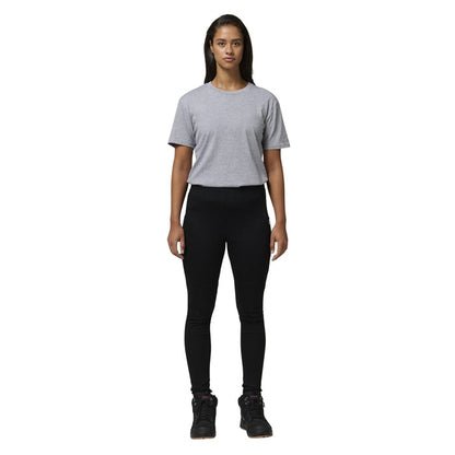 Person wearing a gray t-shirt and black leggings on a white background