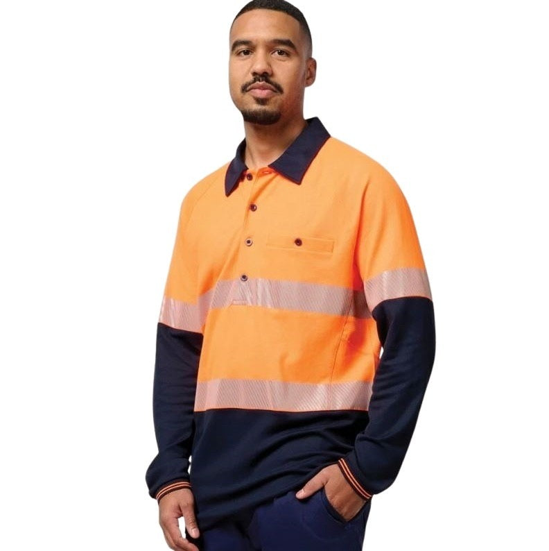 Man wearing an orange and navy high-visibility work shirt on a white background