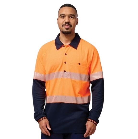 Man wearing an orange and navy high-visibility work shirt on a white background