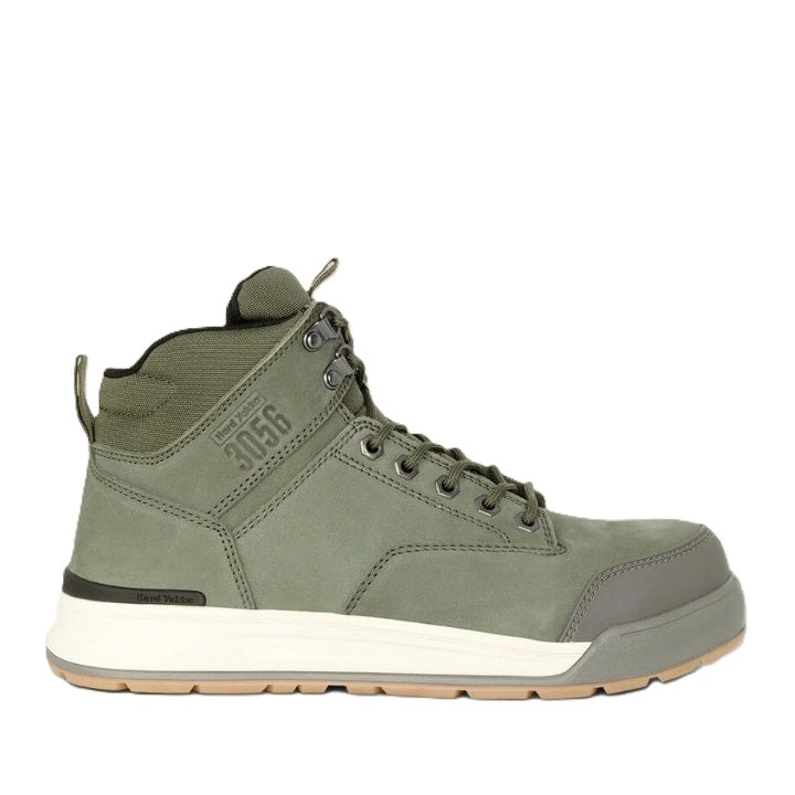 Green hiking boot with white sole on a white background