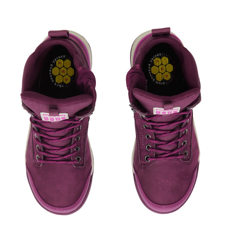 Purple sneakers with a white sole on a white background