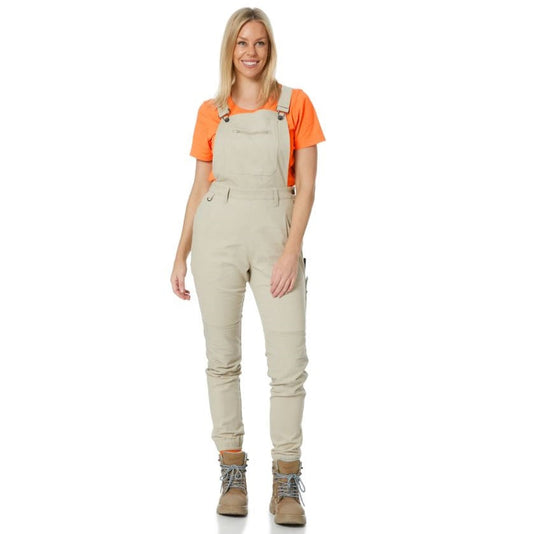 Woman wearing Zadie Stone colour overalls and a Zadie orange shirt 