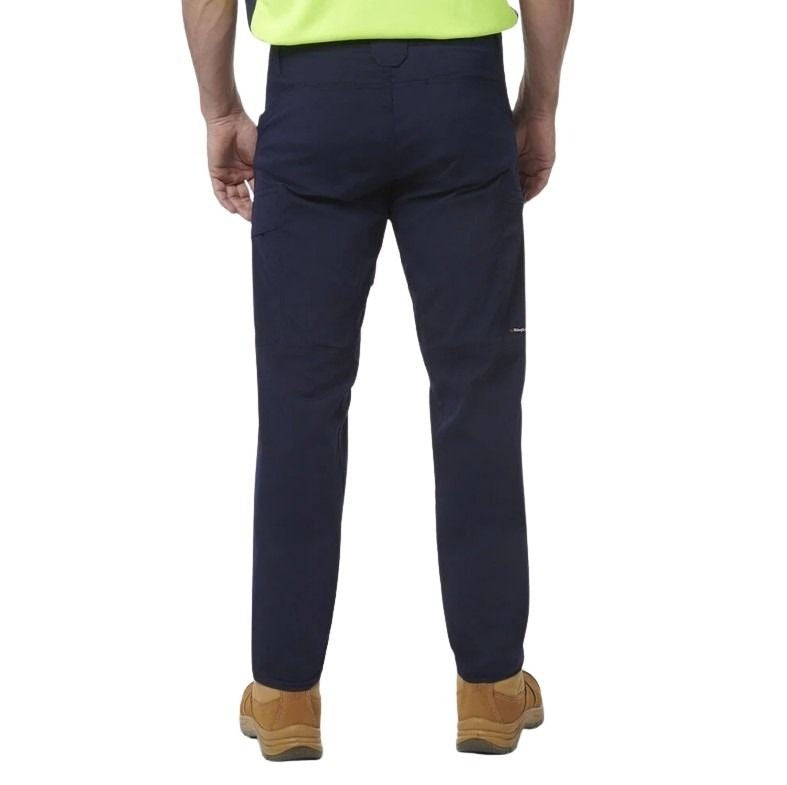 Navy pants worn by a person on a white background