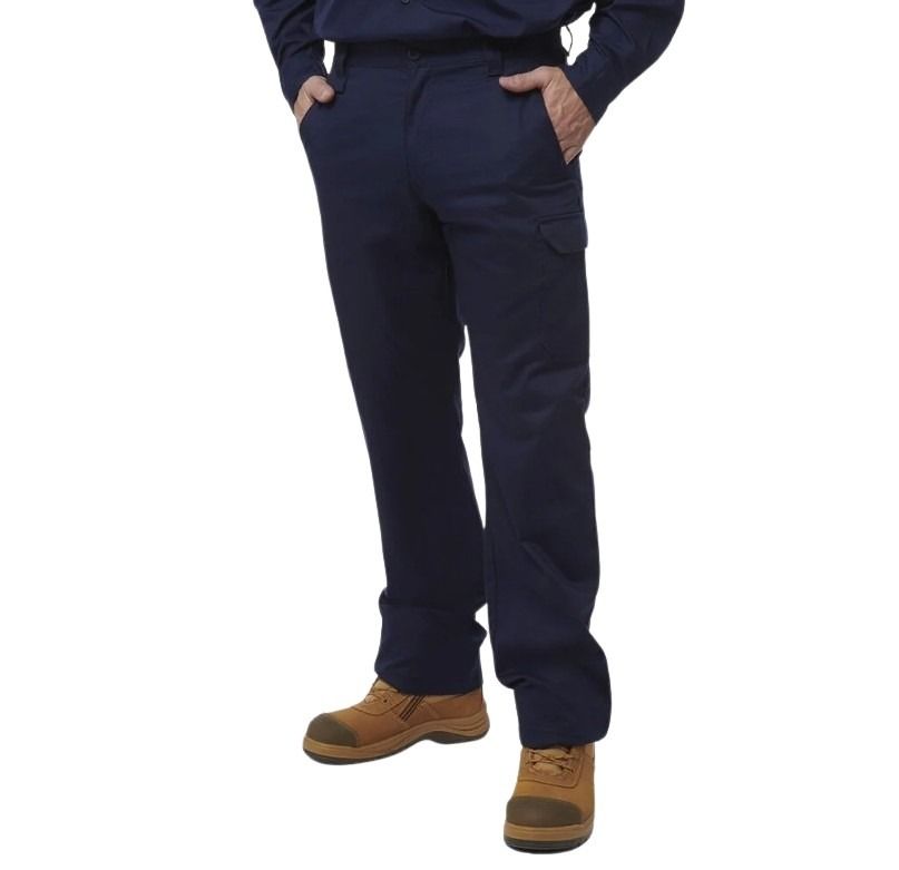 Person wearing navy blue pants and brown shoes on a white background