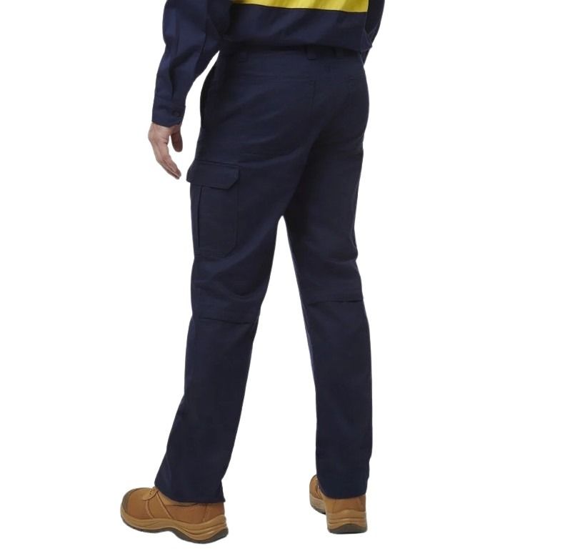 Navy blue work pants worn by a person on a white background