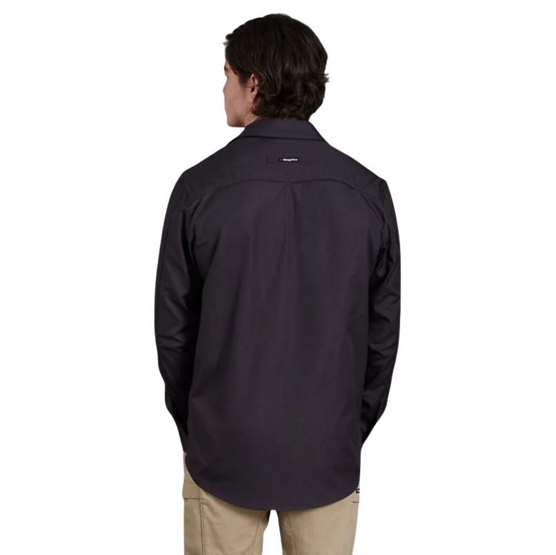 Person wearing a black jacket on a white background