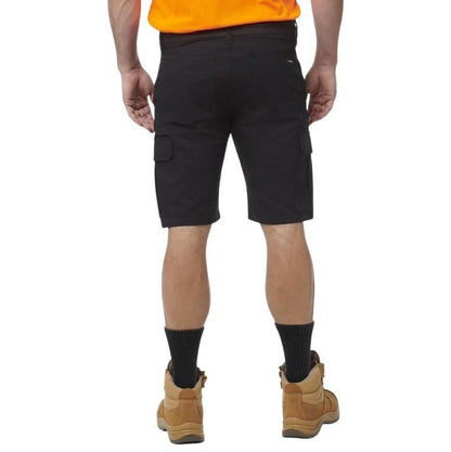Person wearing black cargo shorts on a white background