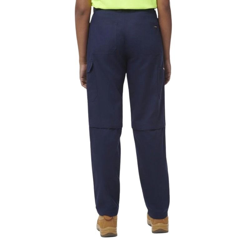 Navy blue pants worn by a person on a white background