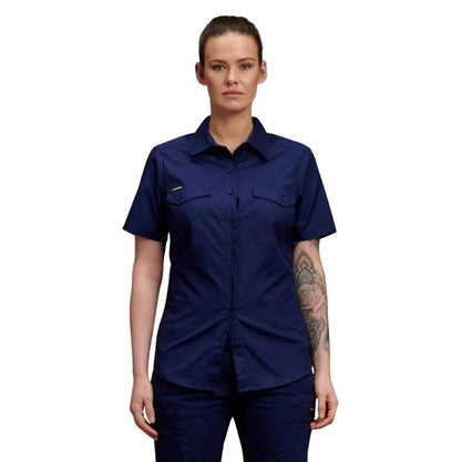 Person wearing a navy blue short-sleeve shirt on a white background